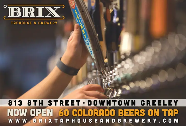 A hand pulling a draft beer tap handle at a bar, with a Brix Taphouse & Brewery ad banner below.