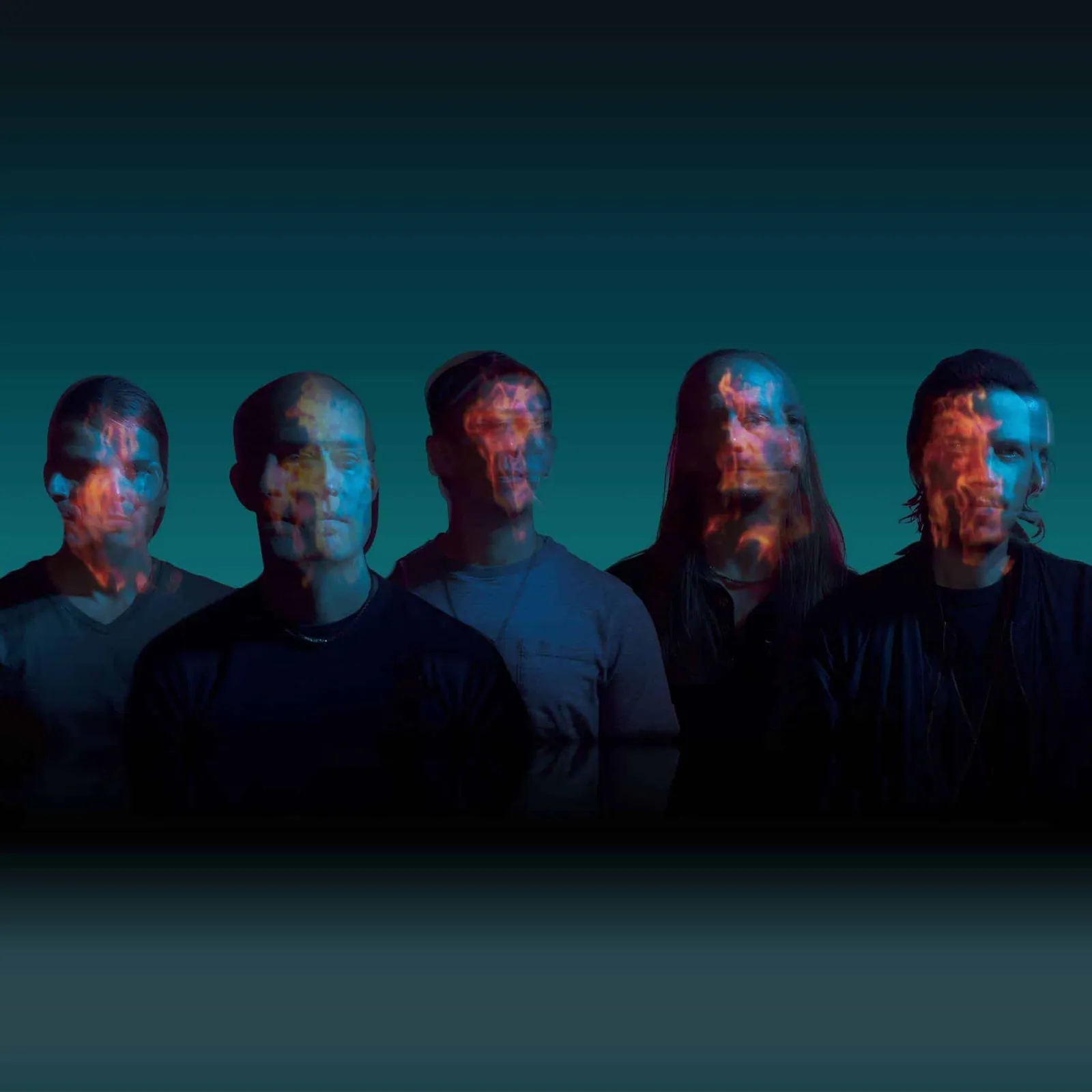Five men stand in a row against a teal backdrop, their faces lit by swirling orange and blue projected imagery.